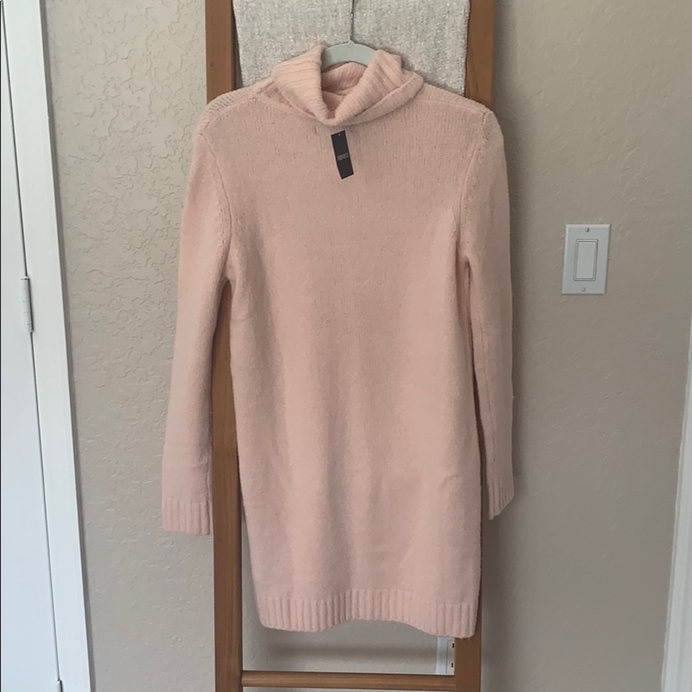 Sweater dress with cowl neck.